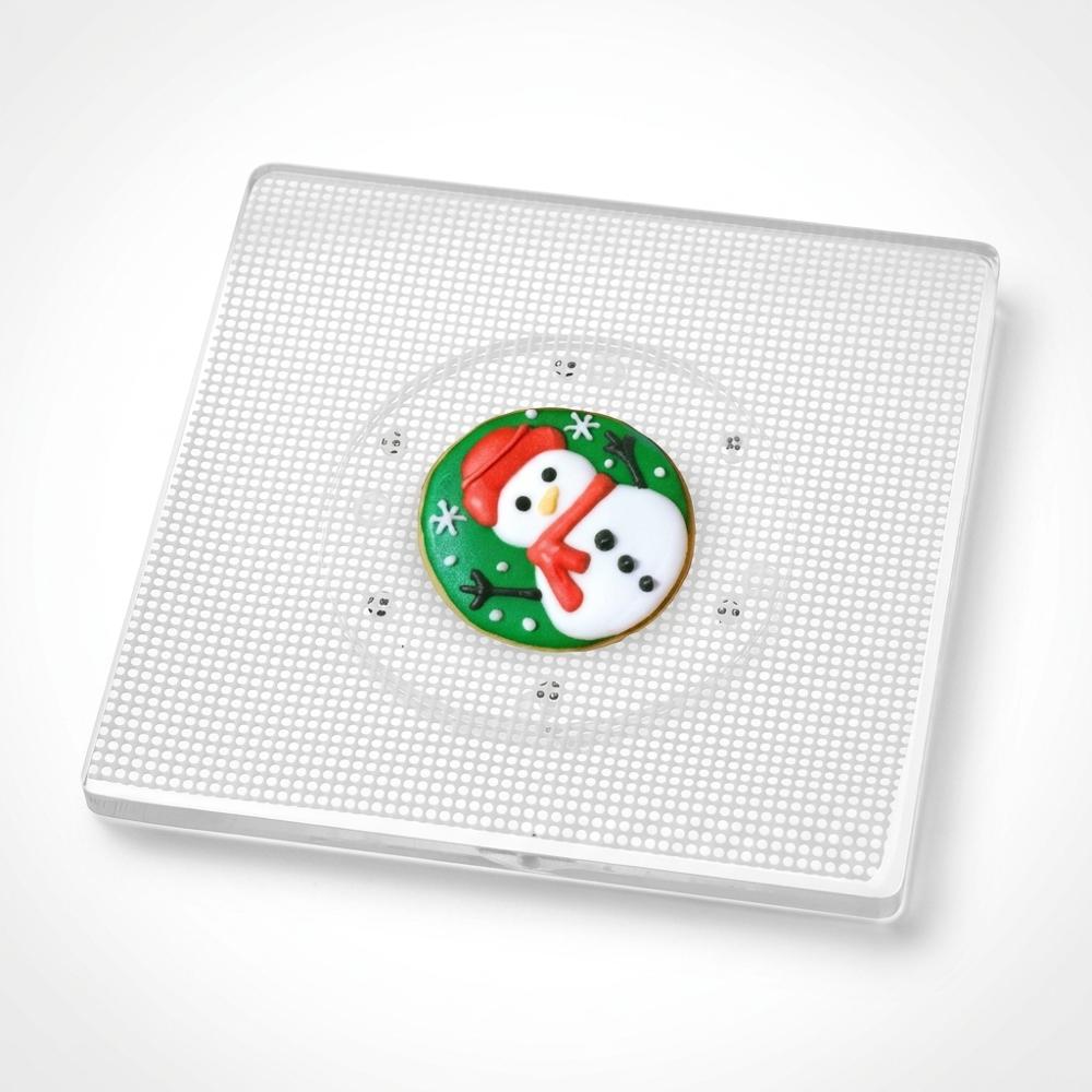 small rotating turntable for spinning a cookie while you pipe