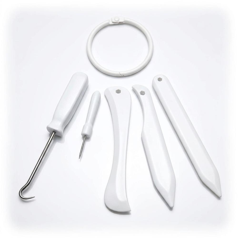 bone folders and scoring tools for crisp paper creases