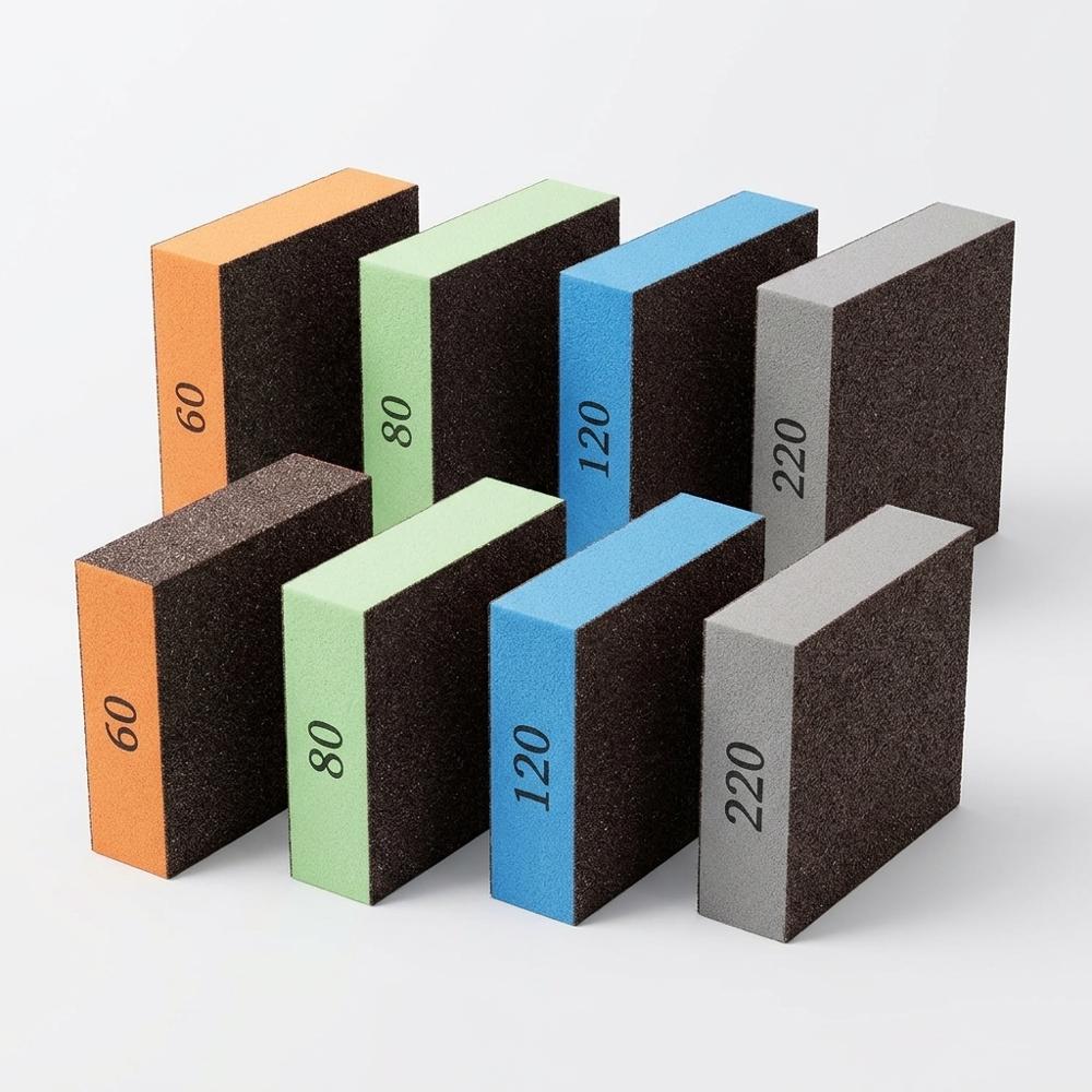 assorted-grit sanding sponges for smoothing a bare board