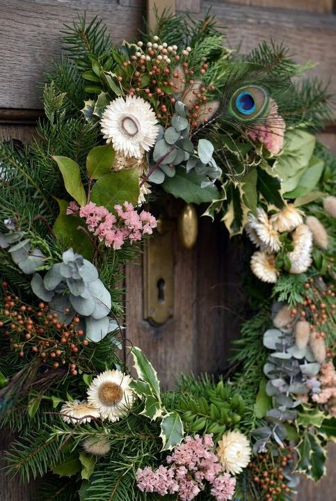 Greenery woven with dried blooms