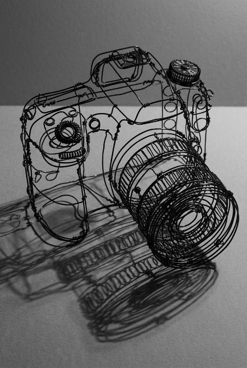 A camera drawn in bent wire