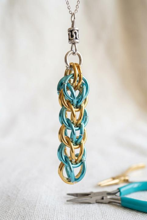 Turquoise and gold, link by link