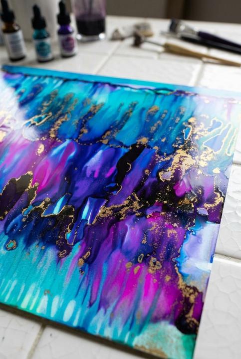 Blue and magenta cascade with gold veins