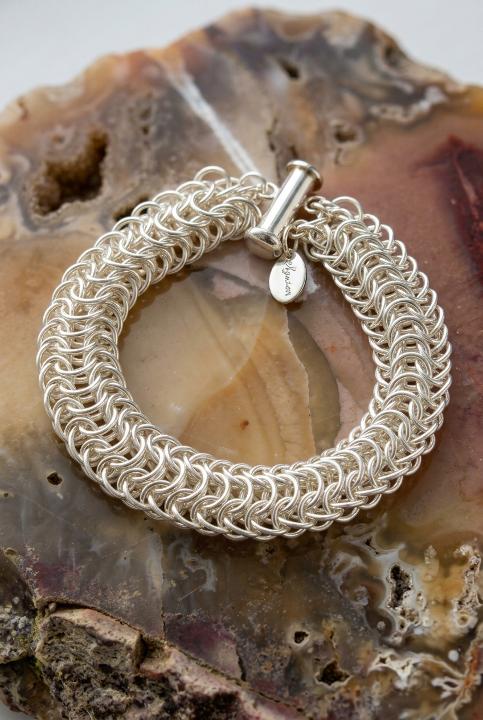 Silver rings, woven round