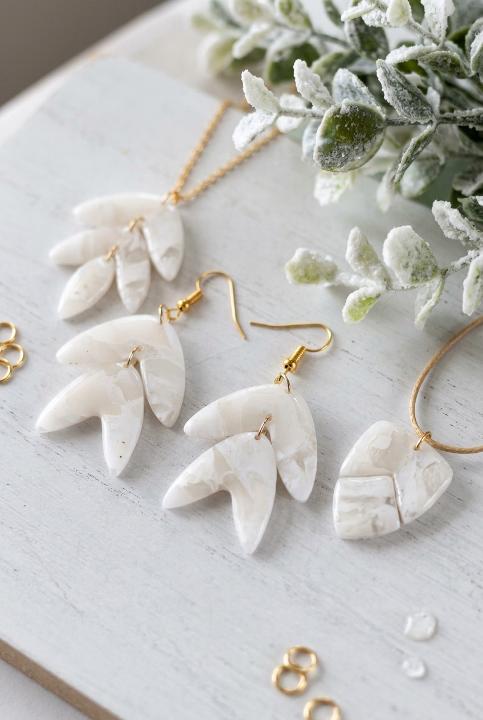 Marbled leaf drops on gold hooks