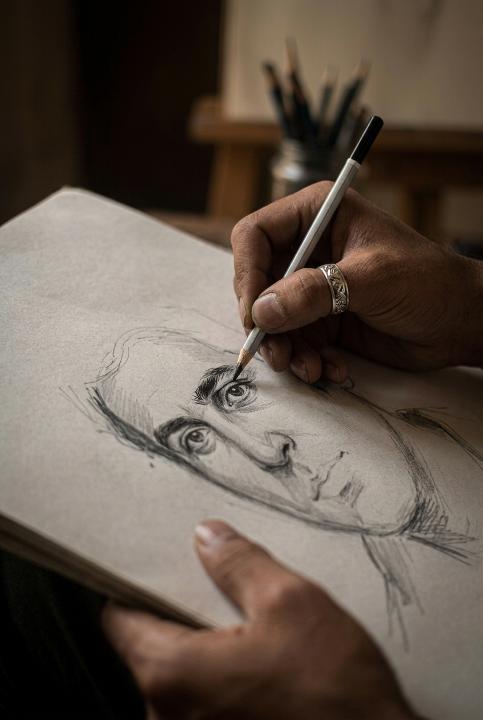 Mid-portrait, pencil still moving